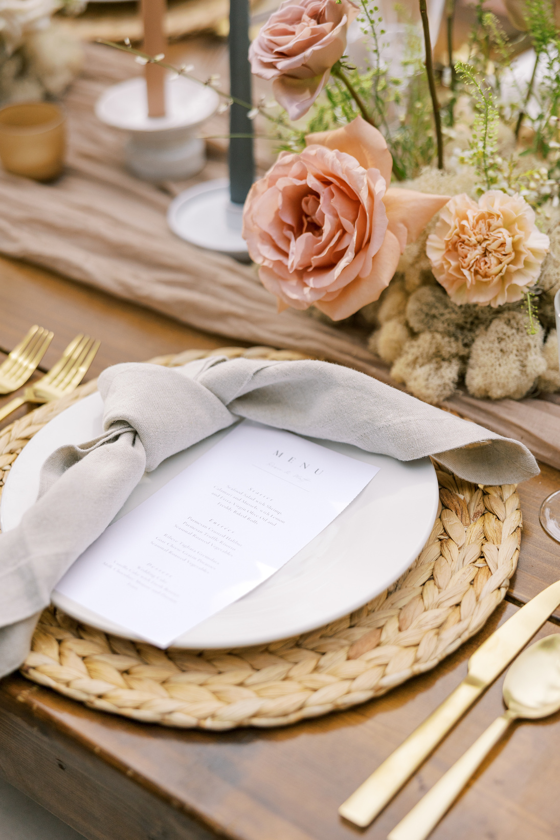 Menu on a Plate with Napkin on Table with Flowers